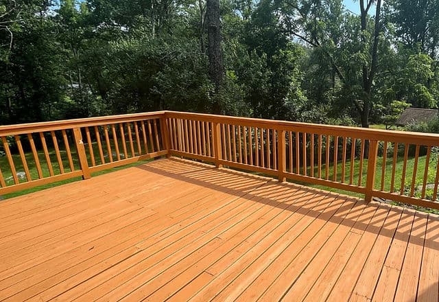 Deck with wood fence in sunlight